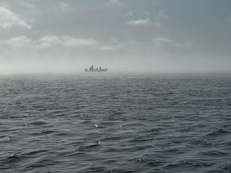A whaling boat is seen from a distance out of Point Hope. (Photo by Guy Omnik)