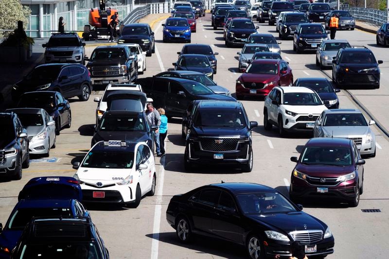 Heavy traffic is seen at O'Hare International Airport in Chicago, Monday, April 15, 2024. Pro-Palestinian demonstrators blocked a freeway leading to three Chicago O'Hare International Airport terminals Monday morning, temporarily stopping vehicle traffic into one of the nation's busiest airports and causing headaches for travelLers. (AP Photo/Nam Y. Huh)