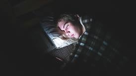 Many teens sleep with their phones, survey finds - just like their parents 