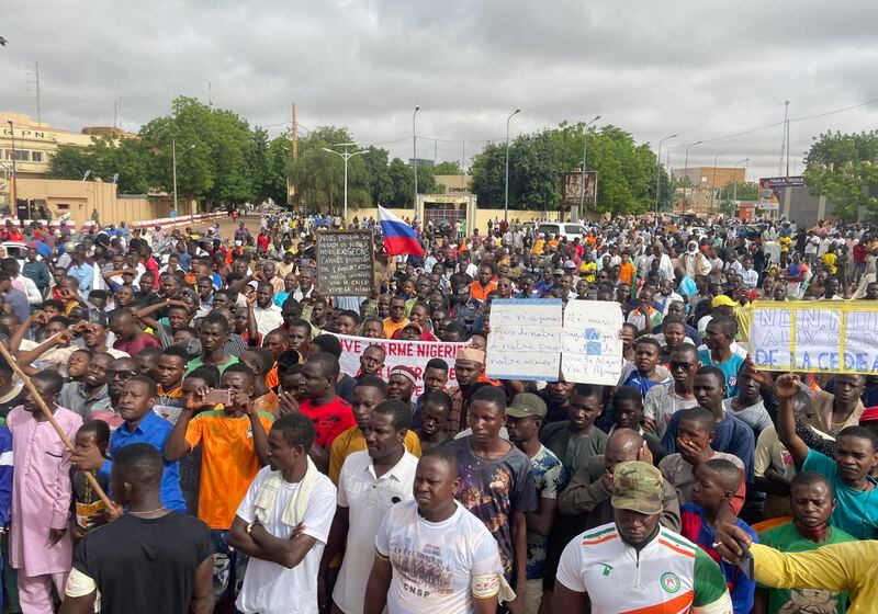Supporters of Niger's ruling junta gather for a protest called to fight for the country's freedom and push back against foreign interference, in Niamey, Niger, Aug. 3, 2023. (AP Photo/Sam Mednick, File)