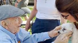 He wanted to pet dogs for his 100th birthday. Hundreds lined up.
