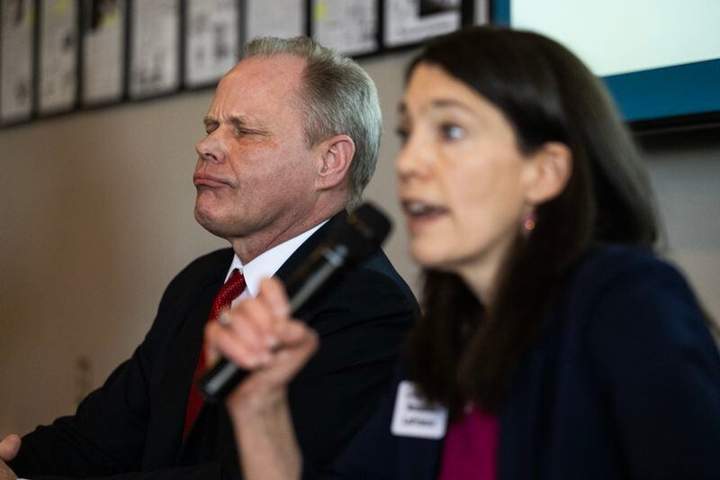 Mayor Dave Bronson gives a puzzled look as Suzanne LaFrance answers a question. (Marc Lester / ADN)