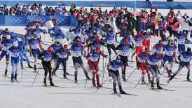 Organizers cut Saturday’s Olympic ski marathon in half. Now they’re facing a backlash.