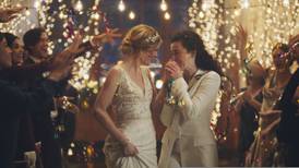 Under pressure, Hallmark pulls gay-themed wedding ads
