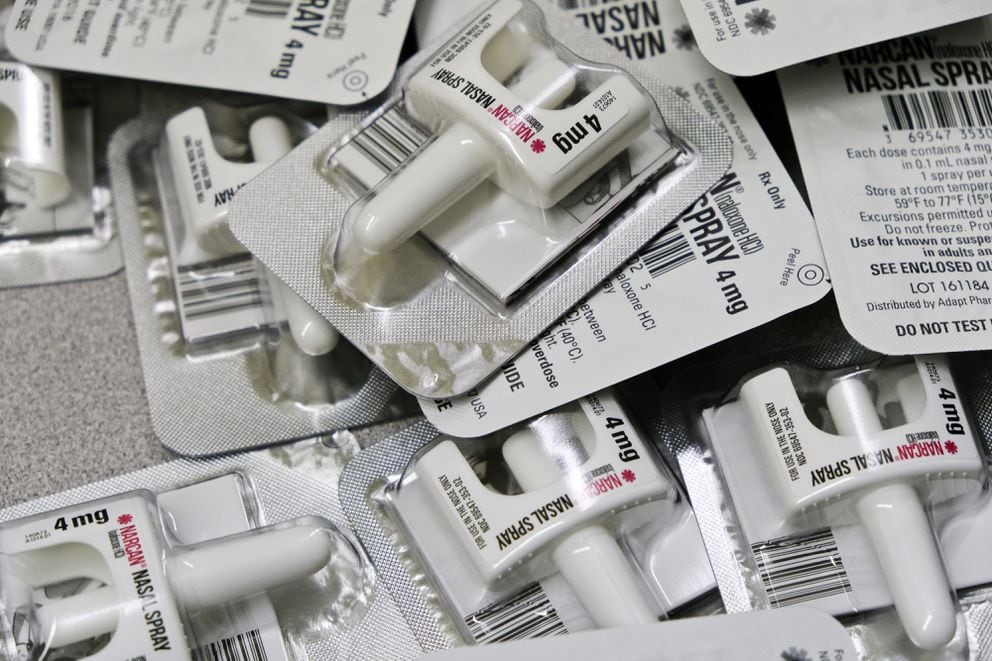 Doses of Narcan, or naloxone, are piled for inclusion in rescue kits. (Marc Lester / Alaska Dispatch News)
