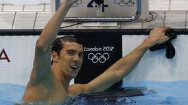 Phelps wins his final individual gold with flair