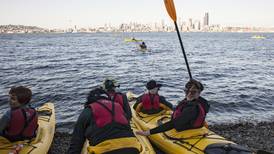 Grabbing paddles in Seattle to ward off an oil giant