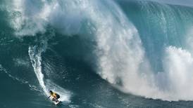 Warming oceans create golden age for big-wave surfing, leaving surfers conflicted