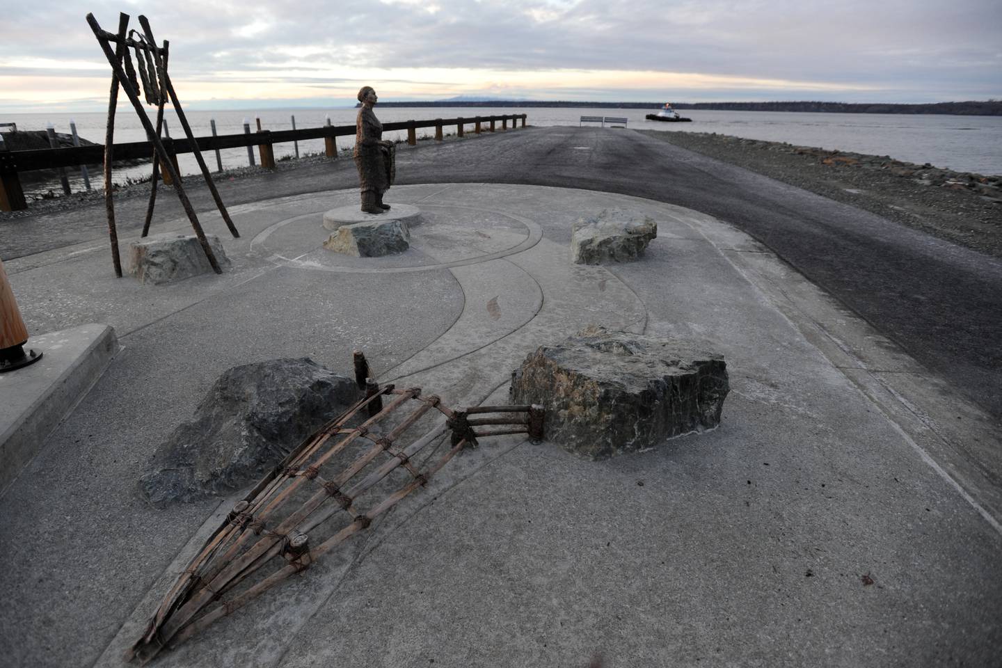 Bronze sculpture at the Ship Creek small boat launch Village of Eklutna Dena'ina culture interpretive display 