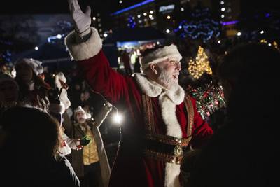Photos: Hundreds gather for Anchorage’s annual holiday tree lighting downtown