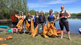 Volunteers remove bottles, yard signs, a bicycle and more during Anchorage’s lake cleanup day