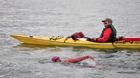 Woman becomes 7th to swim across chilly Kachemak Bay, first via 'naked swimming'
