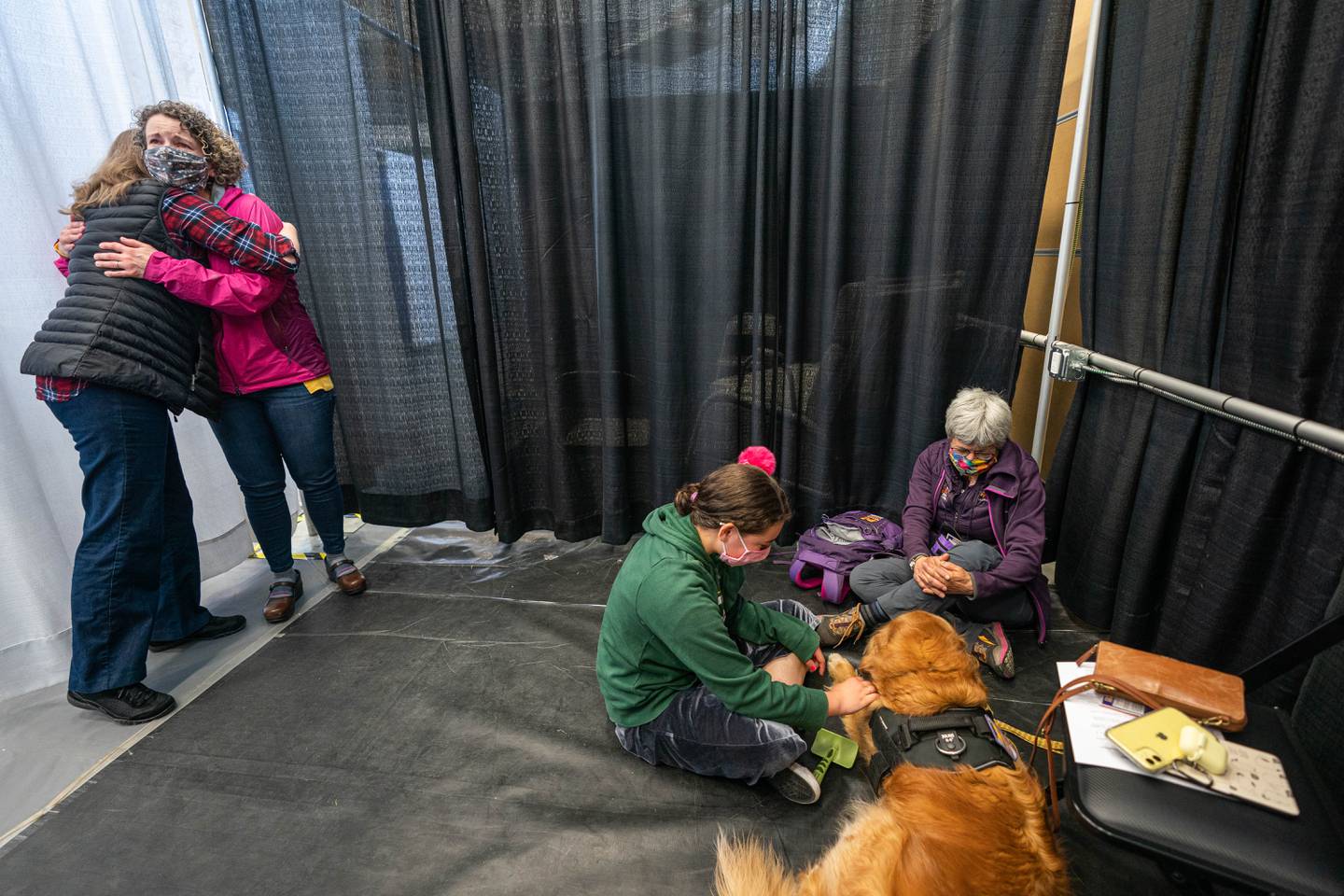 Alicia Notti, Heather Aronno, Karen Loeffler, Lillian Notti, alaska airlines center, dog, vaccine, vaccine clinic
