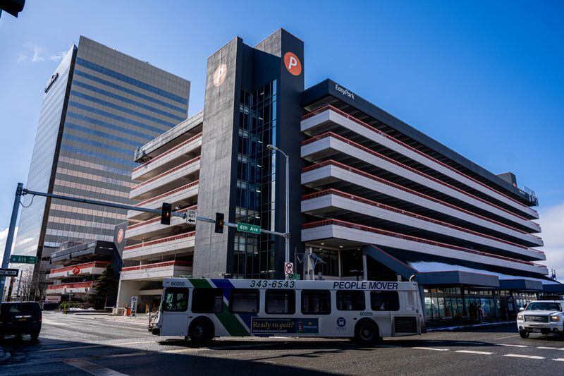 A People Mover bus turns past the downtown transit center on Wednesday, April 10, 2024 in Anchorage. (Loren Holmes / ADN)