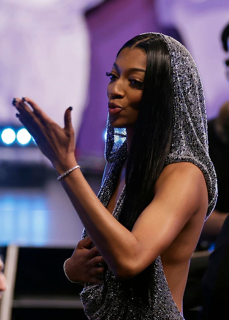 LSU's Angel Reese blows a kiss after being selected seventh overall by the Chicago Sky during the first round of the WNBA basketball draft on Monday, April 15, 2024, in New York. (AP Photo/Adam Hunger)