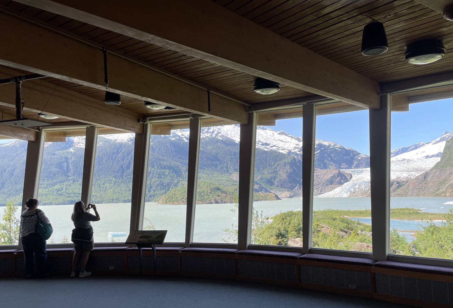 Visitors take images of Mendenhall Glacier near Juneau