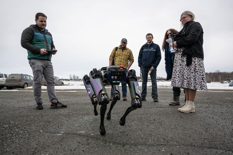 Alaska Department of Transportation program manager Ryan Marlow demonstrates DOT’s robotic dog on March 26, 2024, after it attracted attention in Anchorage. (Marc Lester / ADN)