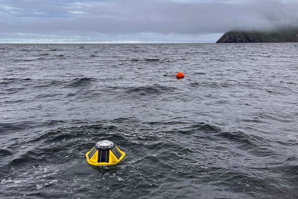 Subsistence hunters measure wave height and use an app to predict conditions at sea