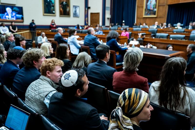 An audience member with an Israeli-flag themed yarmulke listens during a House Committee on Education and Workforce hearing April 17 on Capitol Hill in Washington. (Haiyun Jiang for The Washington Post)