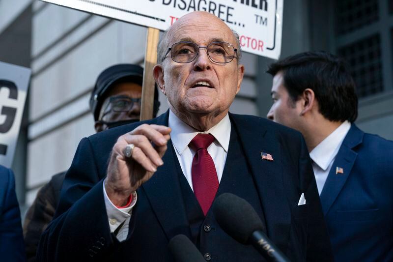Former Mayor of New York Rudy Giuliani speaks during a news conference outside the federal courthouse in Washington, Dec. 15, 2023. (AP Photo/Jose Luis Magana, File)
