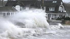Storm batters Northeast, knocking out power, grounding flights and flooding roads