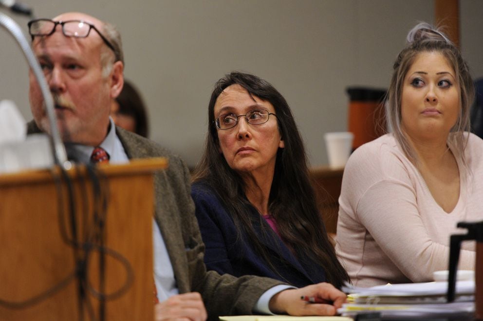 Adoptive mother Anya James, center, listens to testimony during her sentencing at the Nesbett Courthouse on Tuesday, Oct. 24, 2017. (Bill Roth / Alaska Dispatch News)