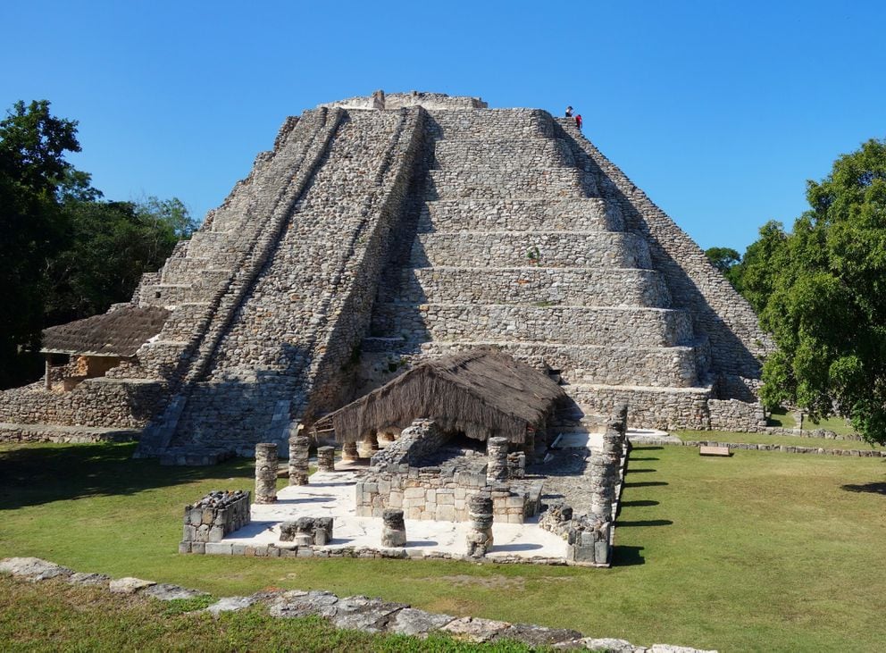 Adventuresome travelers reach the top of the Temple of Kukulcan at the Mayapan ruins near Merida, on Mexico’s Yucatan Peninsula. (Scott McMurren)