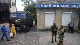 Russians try to subdue Ukrainian towns by seizing mayors