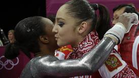 Douglas finishes last on uneven bars as Russian wins gold