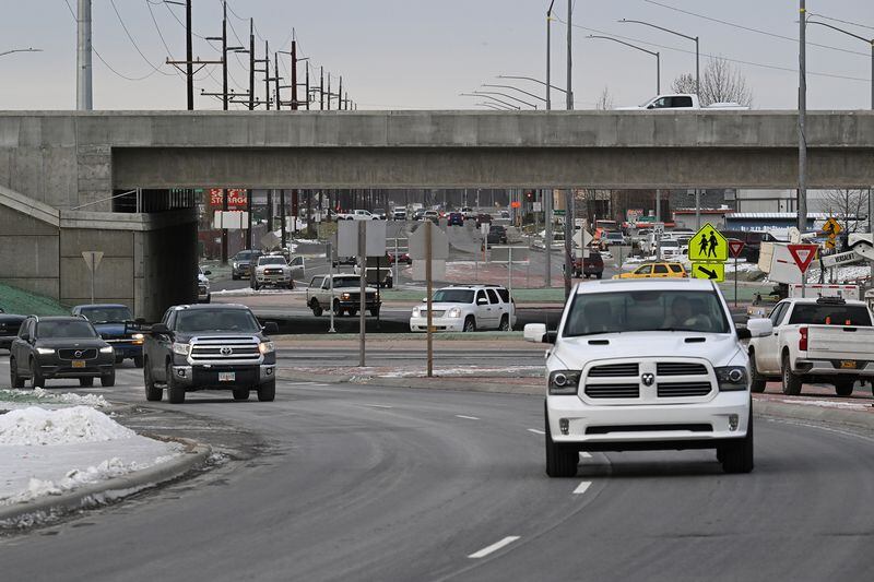 Traffic is flowing again on Dowling Road on Monday, Oct. 31, 2022, after major construction over the summer to replace the Seward Highway overpass bridge and expansion of the two roundabouts. (Bill Roth / ADN) 