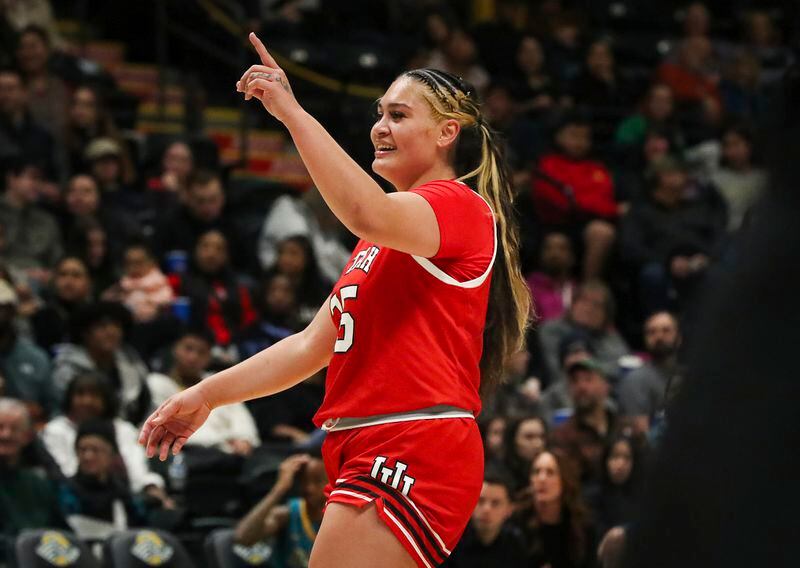 Utah's Alissa Pili signals to her teammate after they made a basket during their game against UAA in the Great Alaska Shootout at the Alaska Airlines Center in Anchorage on Saturday, Nov. 18, 2023. (Emily Mesner/Anchorage Daily News via AP)
