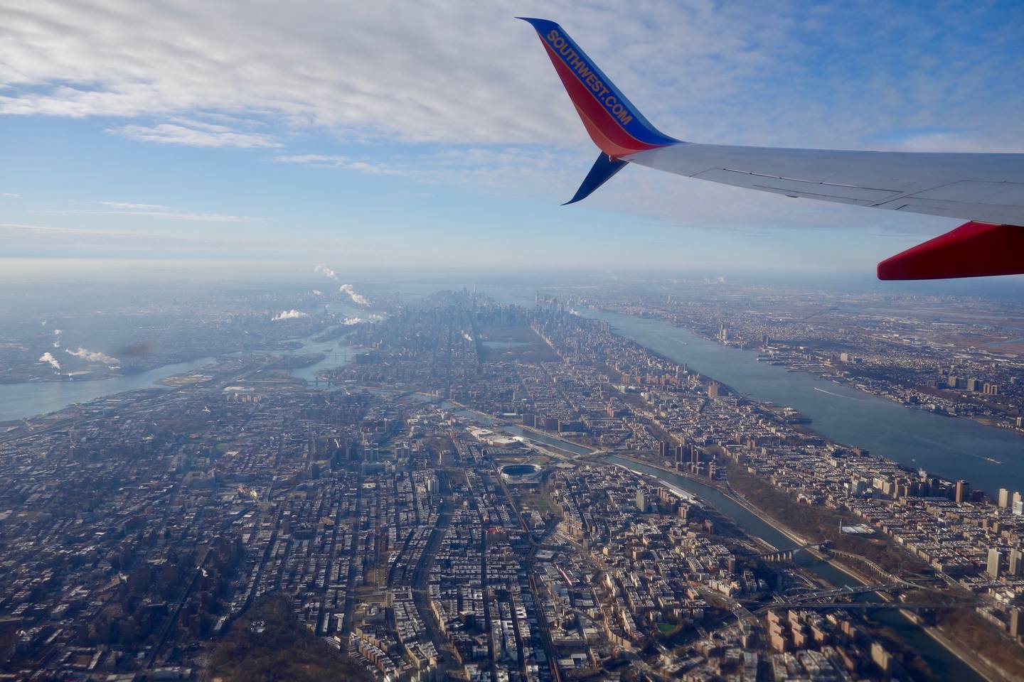 A view of Manhattan from the window seat of a New York to Seattle flight