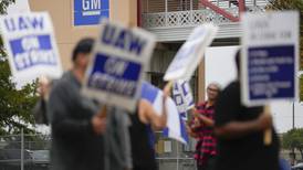Vote on tentative UAW contract with General Motors too close to call