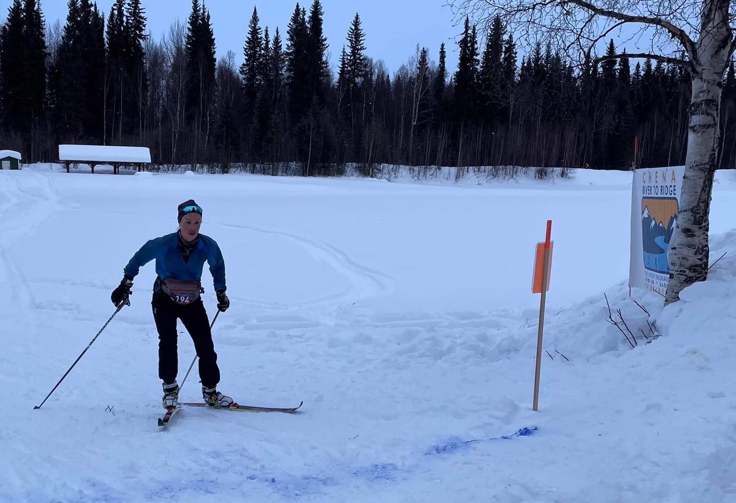 Shalane Frost skis the last few feet of the Chena River to Ridge Race