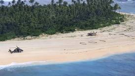 3 men rescued from uninhabited Pacific island after they wrote ‘SOS’ in sand