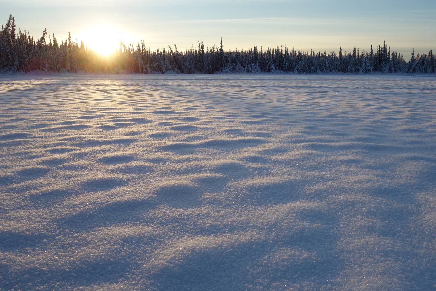 The late-November sun over a Fairbanks lake