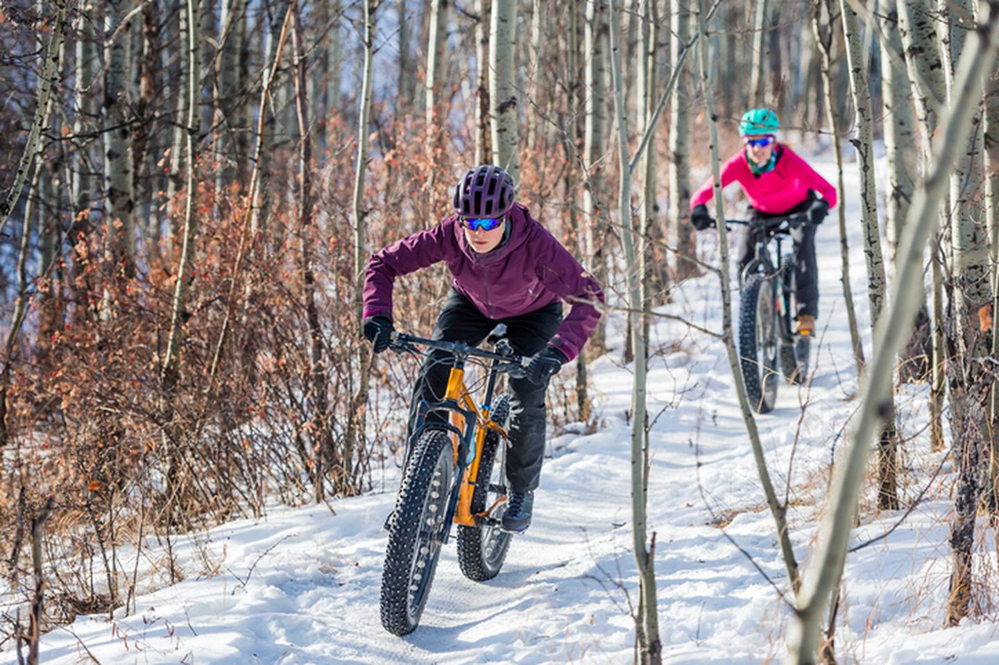 Two Women riding Fatbikes in the Snow