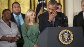 Tearful Obama outlines steps to curb gun deaths