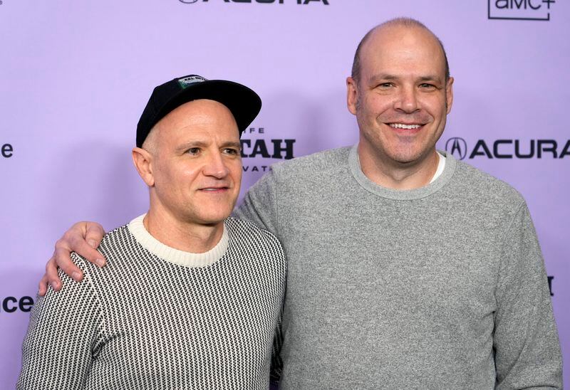 David Zellner, left, and his brother Nathan Zellner, co-directors of "Sasquatch Sunset," pose together at the premiere of the film at Eccles Theatre during the 2024 Sundance Film Festival, Friday, Jan. 19, 2024, in Park City, Utah. (AP Photo/Chris Pizzello)
