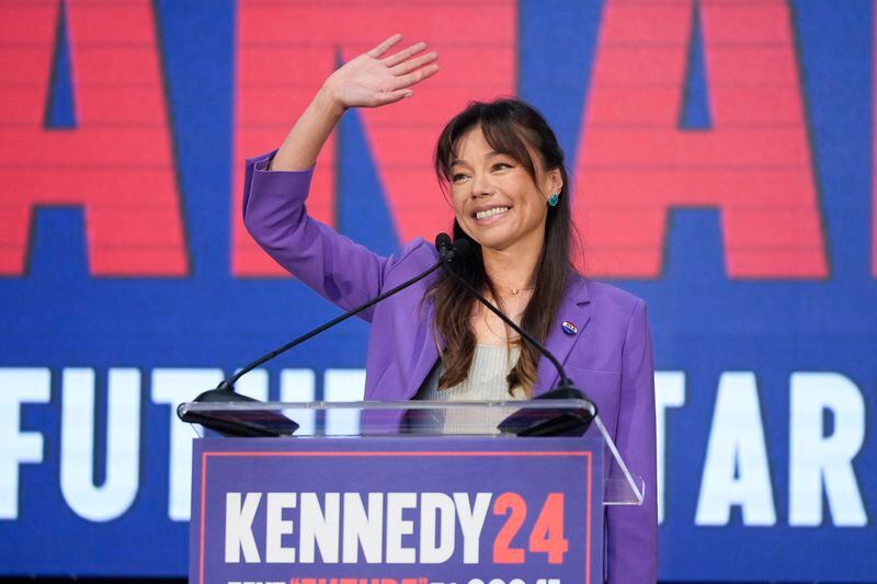Nicole Shanahan waves from the podium during a campaign event for Presidential candidate Robert F. Kennedy Jr., Tuesday, March 26, 2024, in Oakland, Calif. Shanahan has been picked as Kennedy Jr.'s running mate. (AP Photo/Eric Risberg)
