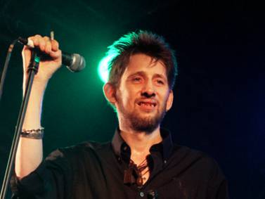 Shane MacGowan, celebrated lead singer of Irish band The Pogues, dies at age 65