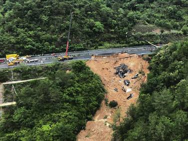 Highway collapse and slide in China kills 36 motorists