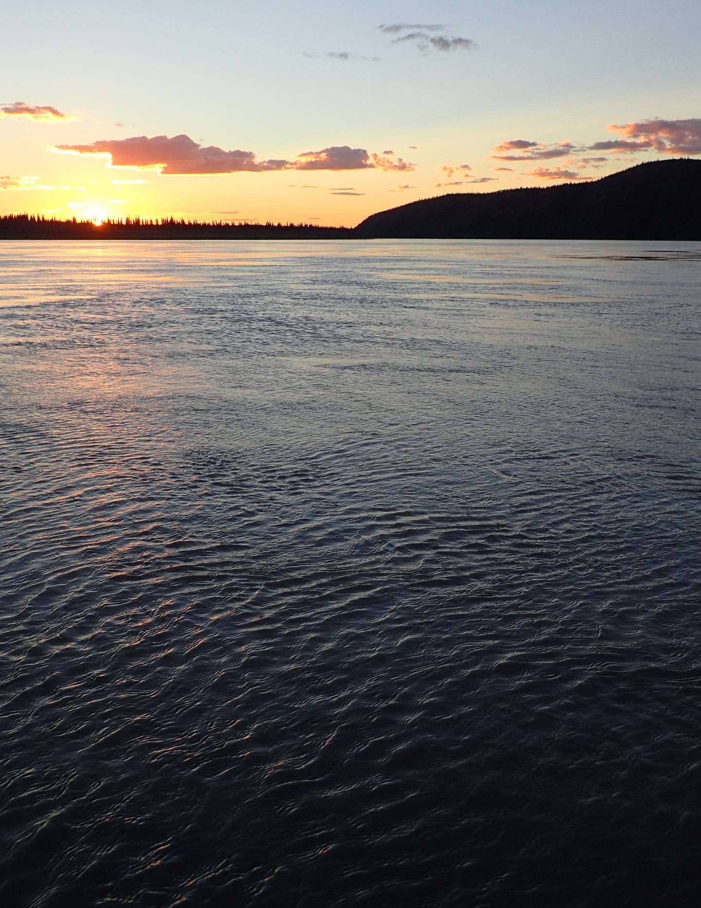 The Yukon River flows toward Circle, Alaska