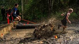 Split by grade, Anchorage XC runners relish the competition on a mud-splashed course
