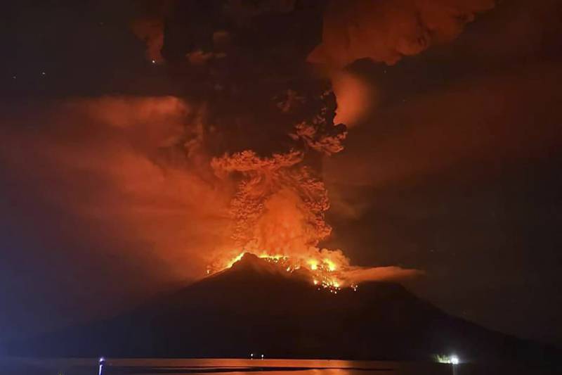 Indonesians leave homes, airport closed as volcano sends ash into stratosphere