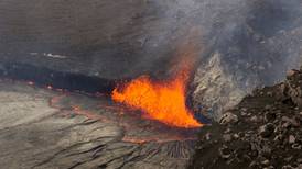 Lava lake on Hawaii's volcano overflows in spectacular show
