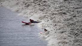 ‘It was like a freight train’: Surfers catch wave in Turnagain Arm