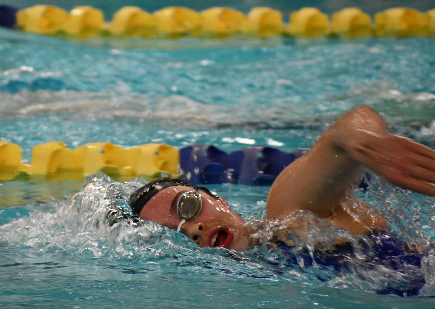 A swimmer competes in the 500 freestyle