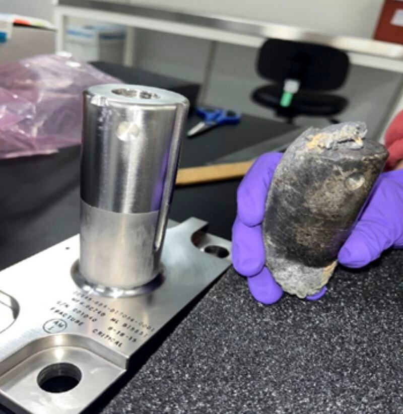 A recovered chunk of space junk from equipment discarded at the International Space Station. The cylindrical object that tore through a home in Naples, Fla., March 8, 2024, was taken to the Kennedy Space Center in Cape Canaveral, Fla., for analysis. (NASA via AP)