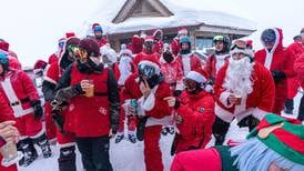 Festive fleet of skiing Santas takes over Alyeska Resort